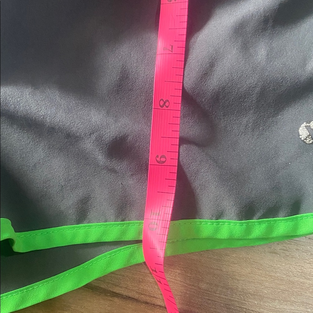 $2 - Xersion Charcoal Shorts with Neon Green Trim - Picture 6 of 7
